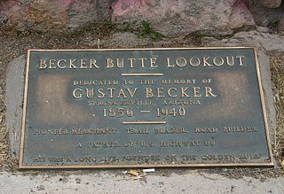 Becker Lookout was named for Walter Becker, described as the father of US 60. Becker was one of the pioneers who lived in this area in the 1920s, and his work led to the designation of US 60 as a transcontinental highway. His work communicating road surfaces and traffic counts led to the establishment of US 60, and this lookout is dedicated to his memory, along with that of his son.