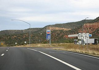 SR 73 departs here from US 60. SR 77 and US 60 continue north to Show Low from this point.