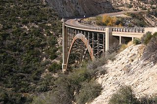 US 60 crosses Pinto Wash here. The Pinto Wash arch bridge was completed in 1949, bypassing the original road which was significantly more windy and longer than the present alignment. The Pinto Wash bridge was voted the most beautiful steel bridge of 1949, as seen by the plaque on the bridge.