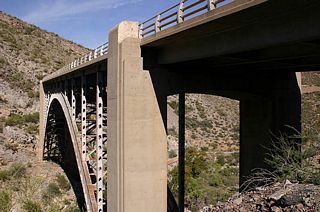 The Queen Creek Bridge was completed in 1953. This 651 foot long steel arch bridge is typical of many in Arizona completed during the 1940s and 1950s.