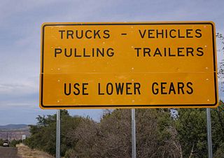After the pullout, this sign advises motorists to use lower gears if they are a truck or pulling a trailer. It's a wild ride ahead, and a long way down to the bottom.