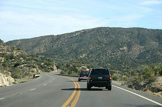 US 60 follows Bloody Tanks Wash to Miami. Bloody Tanks wash is named for the nearby Bloody Tanks, which are named after a battle between white men and the Apaches in 1864.