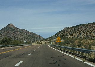 US 60 has various stretches of passing lanes through the mountains.