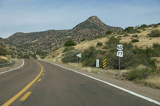 US 60 and SR 77 remain co-signed north of Globe, as seen on this sign assembly.