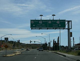 Interestingly, through traffic on US 60 must turn to stay on US 60, while the main road becomes US 70. This is a legacy of the original construction of US 60 between 1929 and 1934, when US 70 was the only through route at this point. US 70 was co-signed with US 60 until 1969 on this road.
