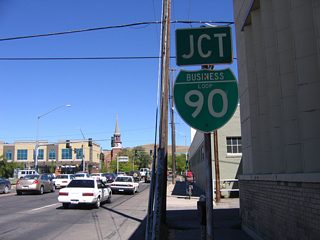 U.S. 93 Business (Orange Street) leaves the intersection with Front and Main Streets to travel one block north to junction Business Loop I-90 (Broadway Street / old U.S. 10). Business Loop I-90 follows Broadway Street east through Downtown Missoula to Van Buren Street (U.S. 12) and west to Reserve Street (U.S. 93).