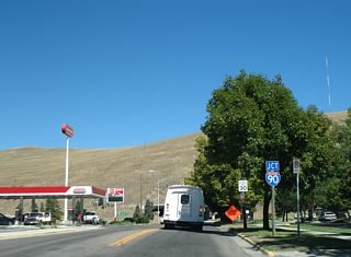 U.S. 93 Business emerges from the Orange Street Underpass at 2nd Street, just one block south of the diamond interchange with I-90/MT 200.
