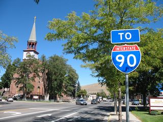 An Interstate 90 trailblazer at Pine Street directs motorists northward along U.S. 93 Business (Orange Street) from Downtown to the freeway.