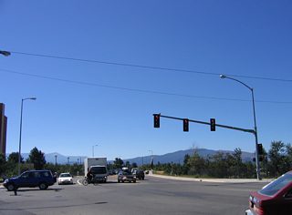 U.S. 93 Business (Orange Street) veers southwest to span the Clark Fork river beyond the intersection with Main and Clark Streets.
