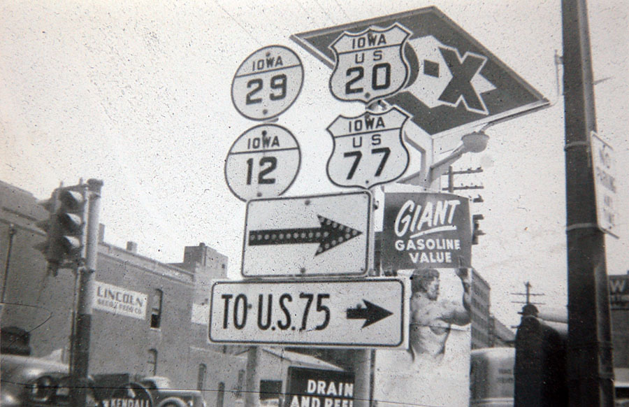 Iowa - State Highway 12, State Highway 29, U.S. Highway 77, and U.S. Highway 20 sign.