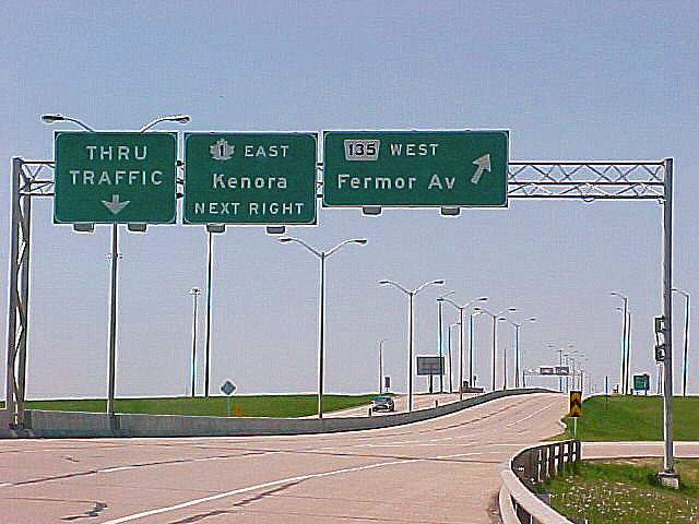 Manitoba - provincial connecting route 135 and Trans-Canada Route 1 sign.