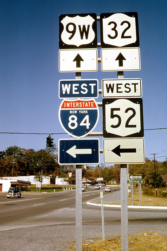 New York - U. S. highway 9W, State Highway 32, State Highway 52, and Interstate 84 sign.