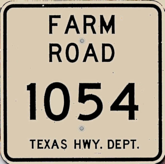 Texas farm to market road 1054 sign.