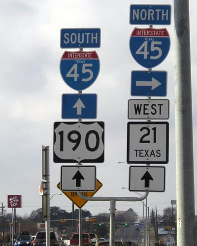 Texas - State Highway 21, U.S. Highway 190, and Interstate 45 sign.