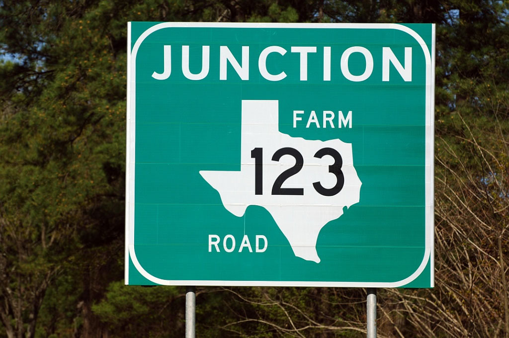Texas farm to market road 123 sign.