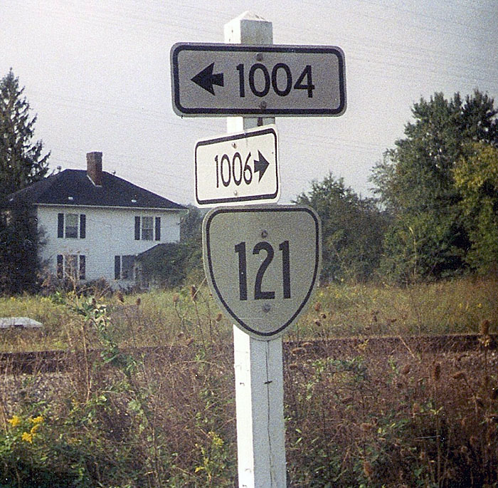 Virginia - state secondary highway 1006, state secondary highway 1004, and State Highway 121 sign.